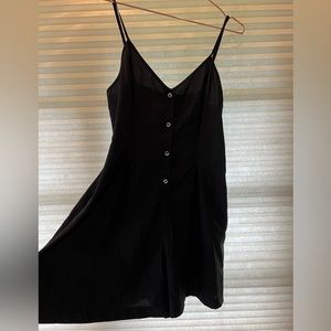 Black silky flowy romper with pockets